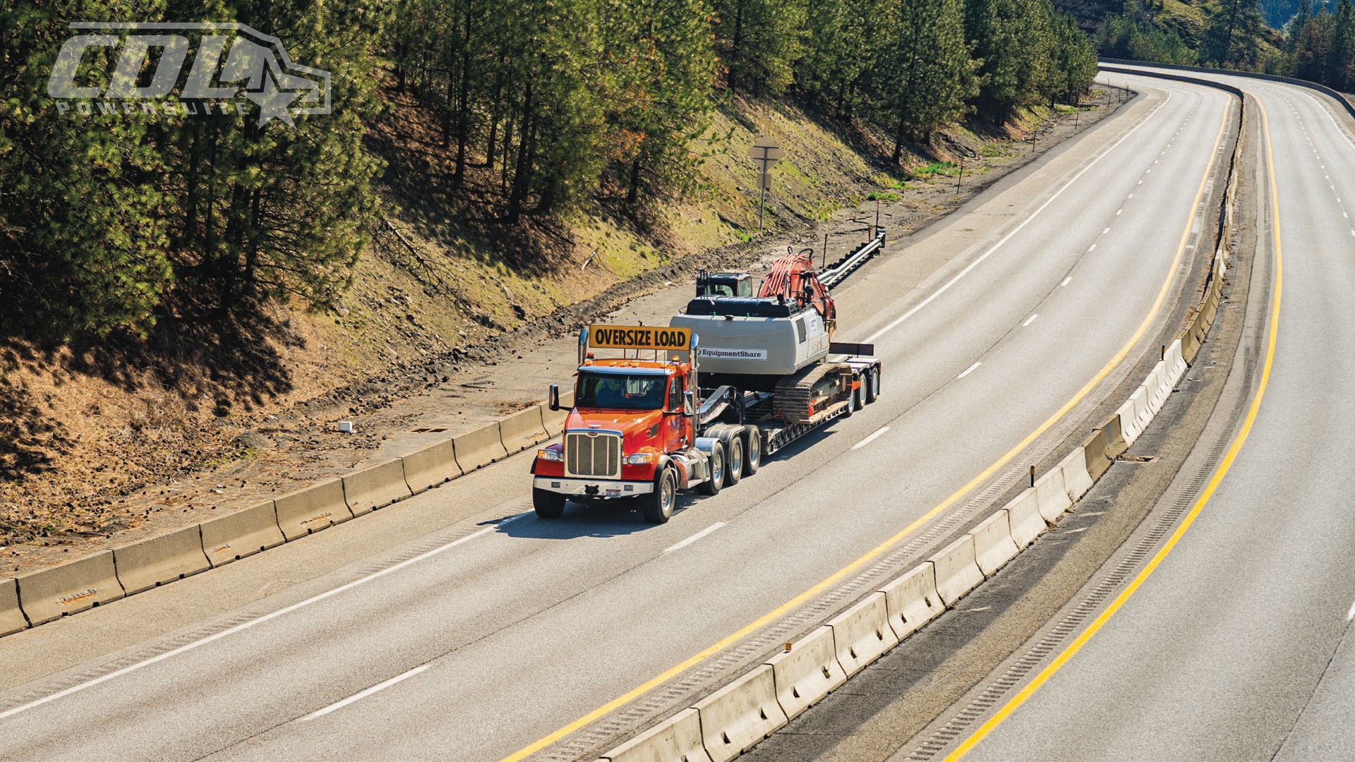 Truck hailing heavy equiptment