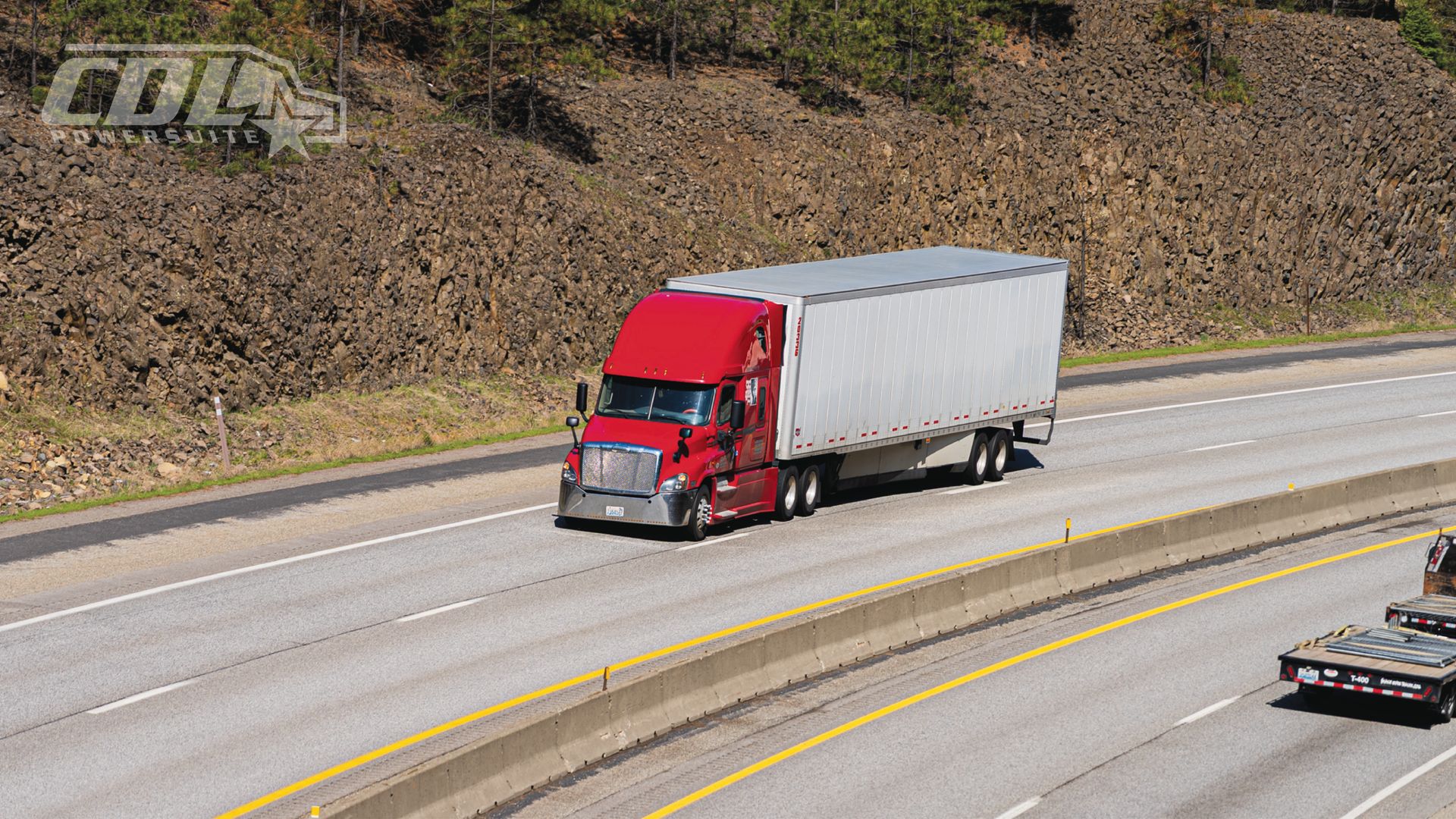 Red Semi Truck in Mountain