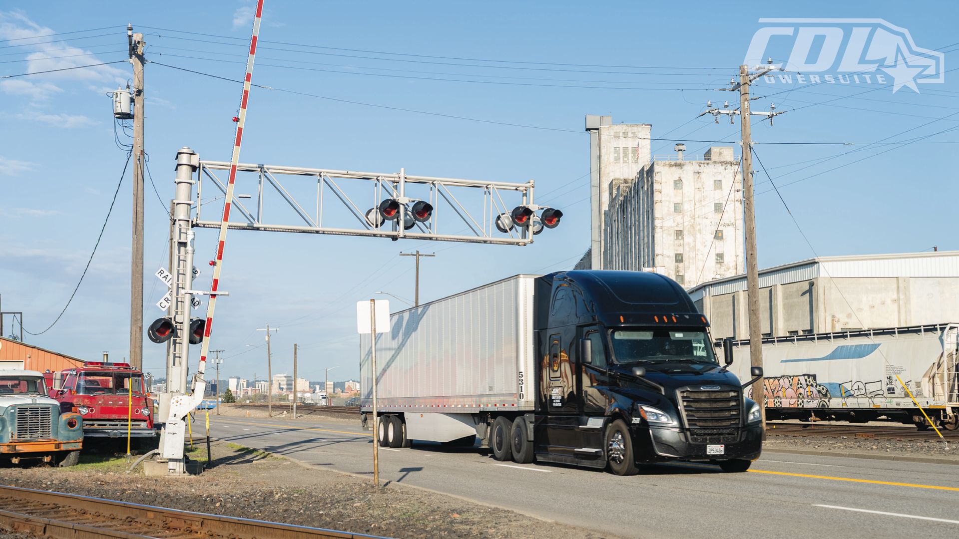Semi Truck at Railroad Crossing