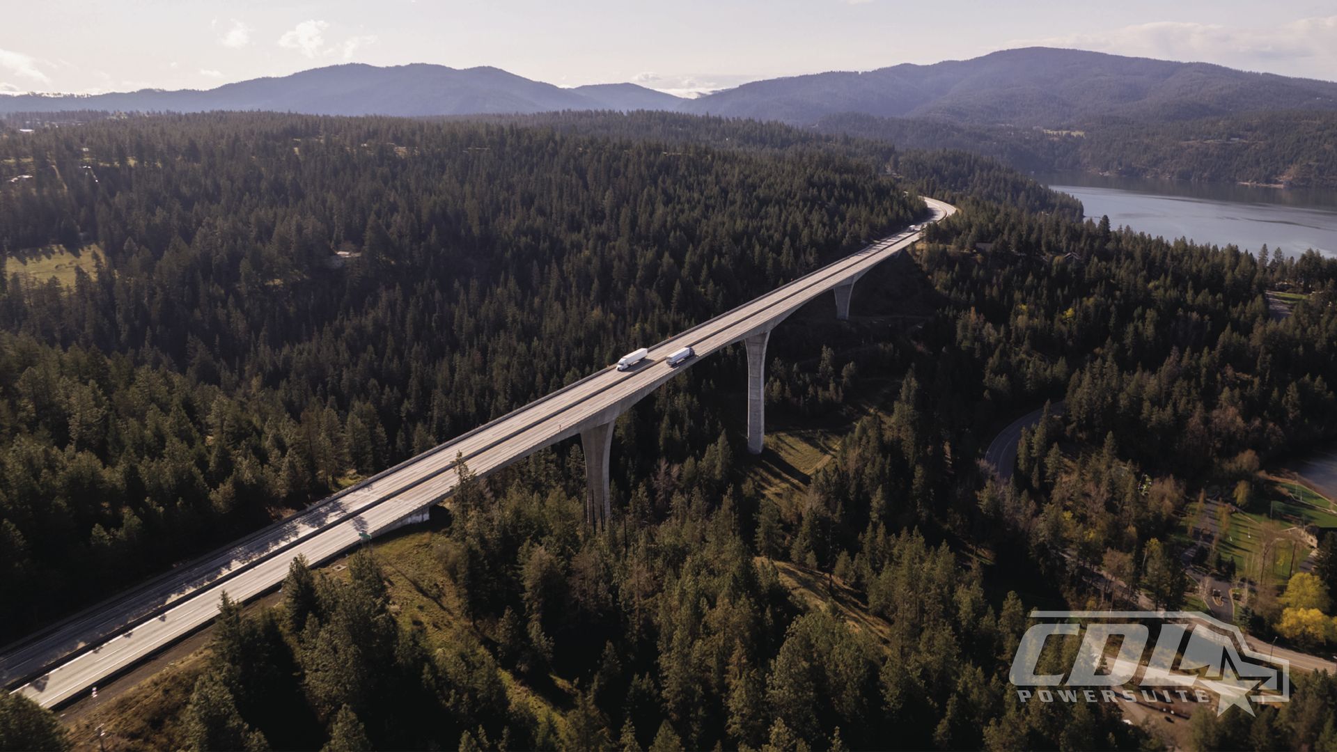 Two Trucks on a Bridge
