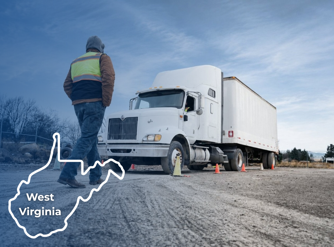 A CDL instructor in a reflective vest stands in an outdoor training lot with a semi-truck