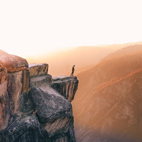 man standing on edge of cliff | same day emergency dentist temecula CA 92592