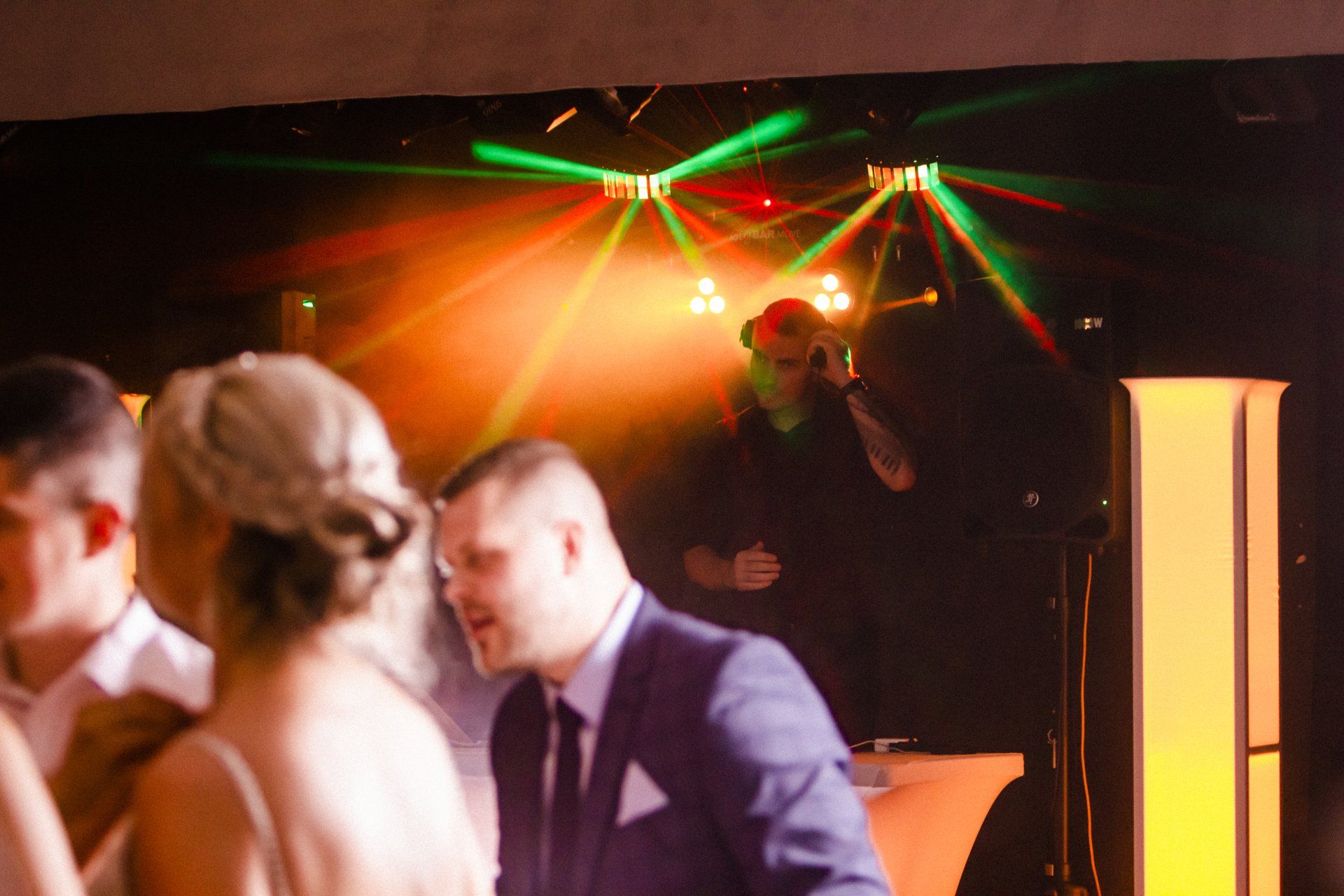 Spectrum DJ glancing over the wedding guests to read the room after the First Dance