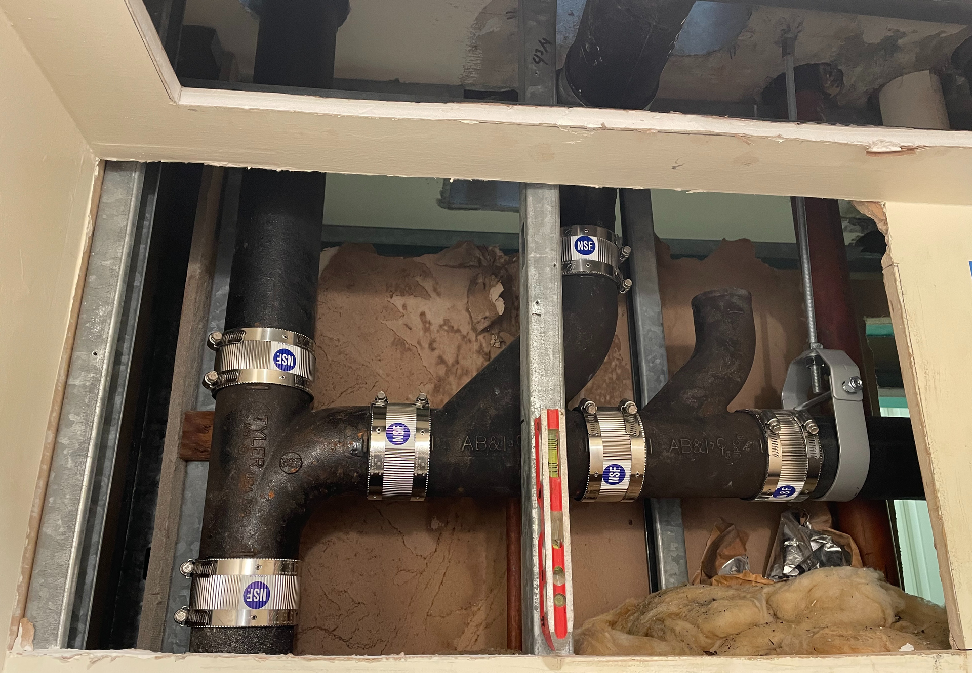 A bunch of pipes are connected to each other in a room