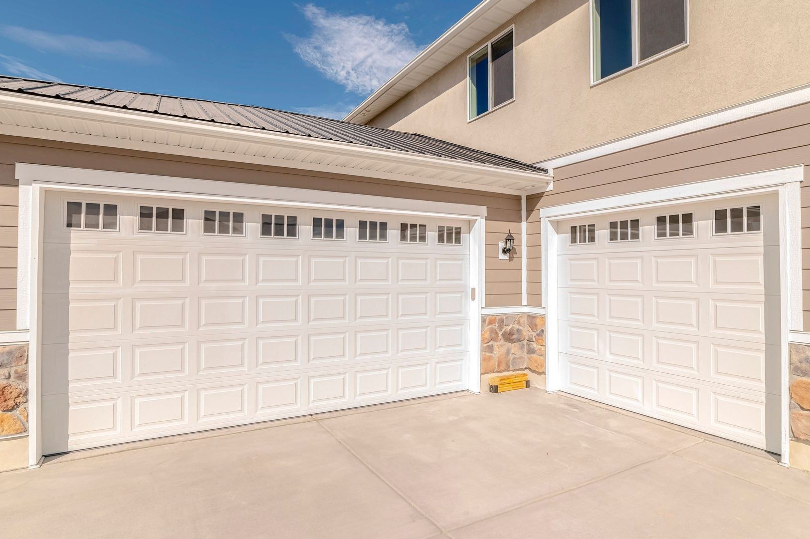 Window raised panel garage doors.