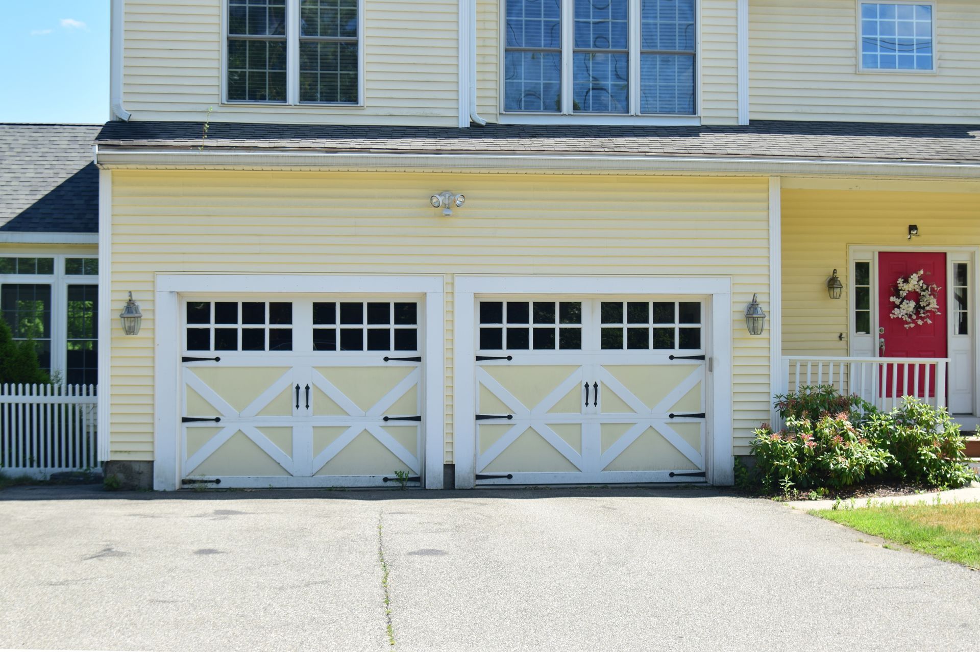 Double window overlay carriage house garage doors