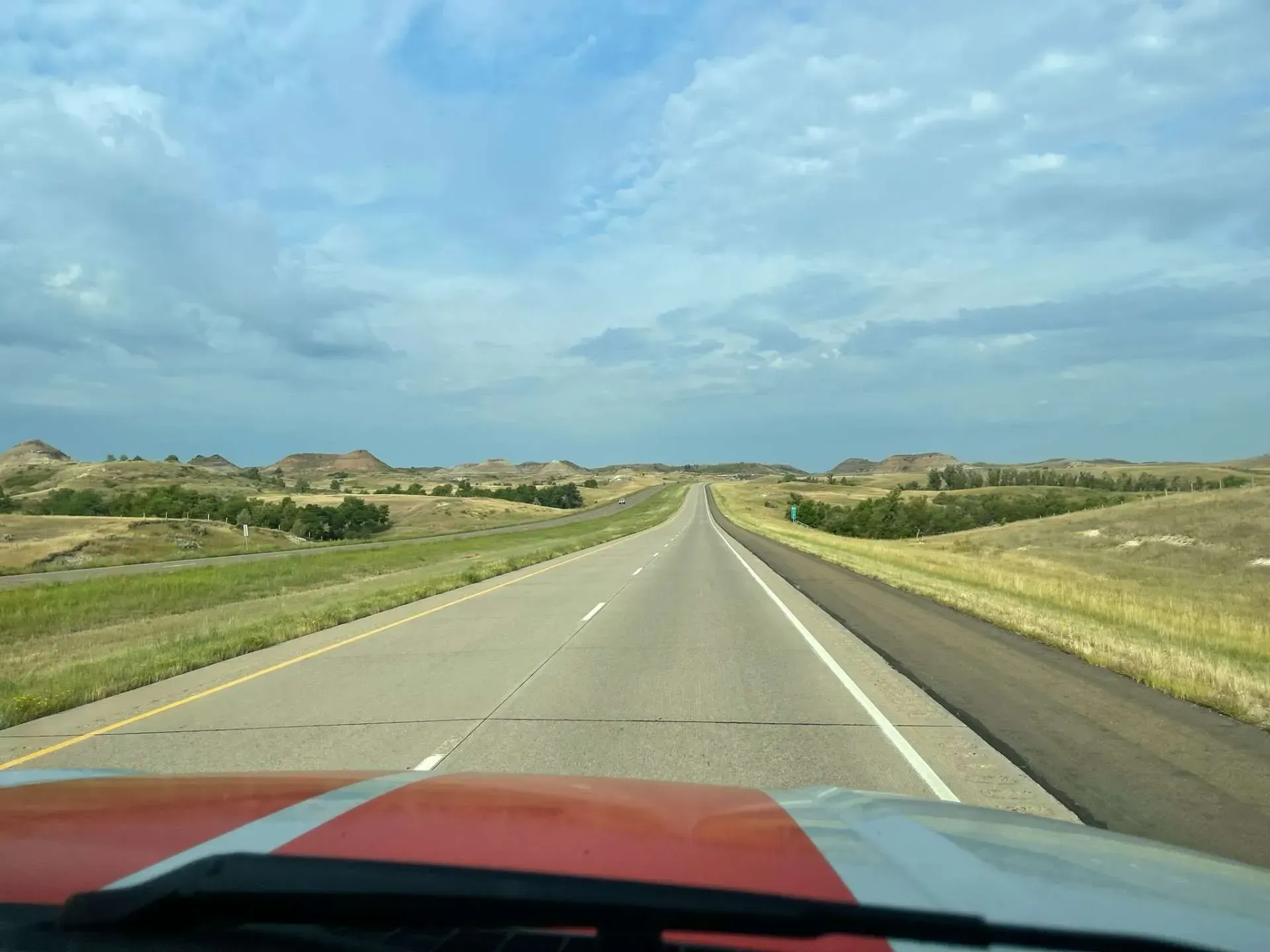 Open highway in Northeast Indiana representing long-distance moving services by MovePro
