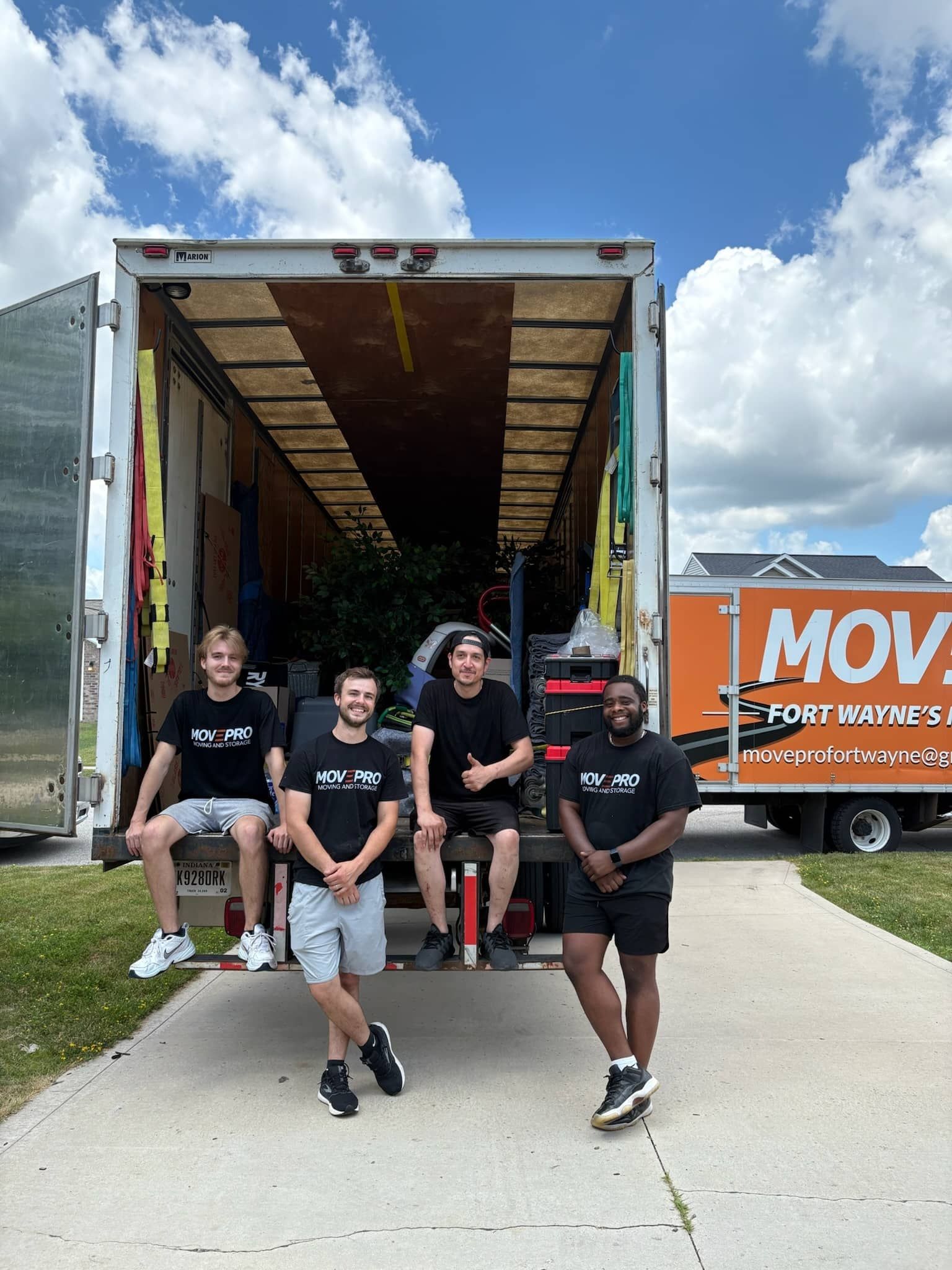 MovePro truck with open ramp ready for loading furniture during a residential move