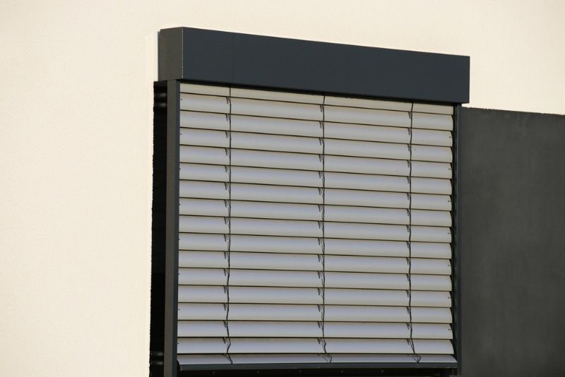 A Close Up of a Window With Blinds on It — BTS Blinds & Awnings in Singleton, NSW