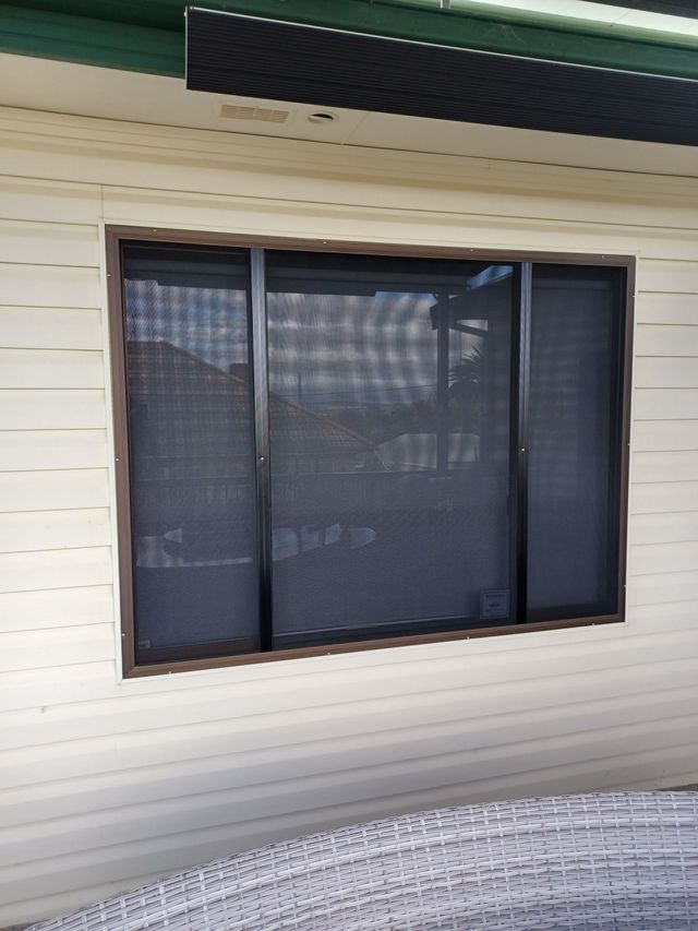 There is a Large Window on the Side of a House — BTS Blinds & Awnings in Gunnedah, NSW