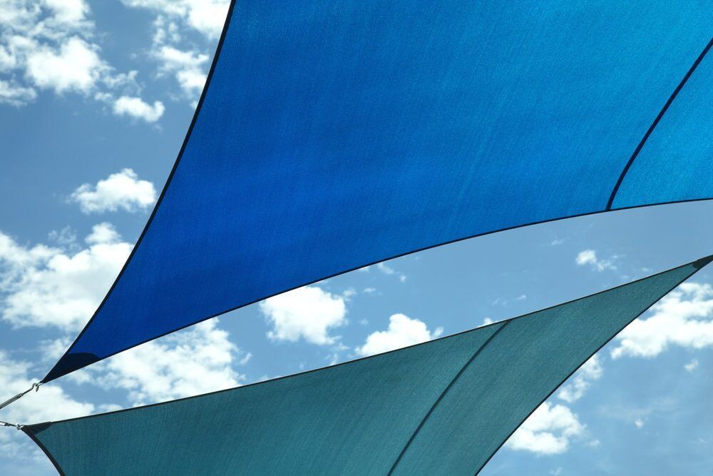 Blue and Turquoise Shade — Professional Shade Sail Installation in Noosa, QLD