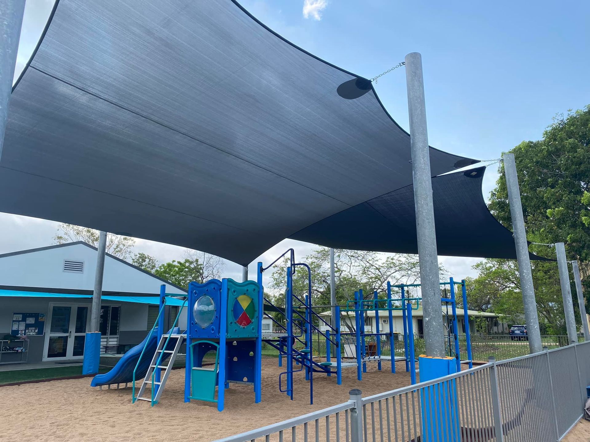 Playground Shaded by a Large Canopy — Professional Shade Sail Installation in Noosa, QLD