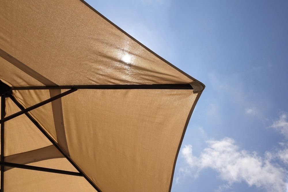 Tan Patio Umbrella — Professional Shade Sail Installation in Mooloolaba, QLD