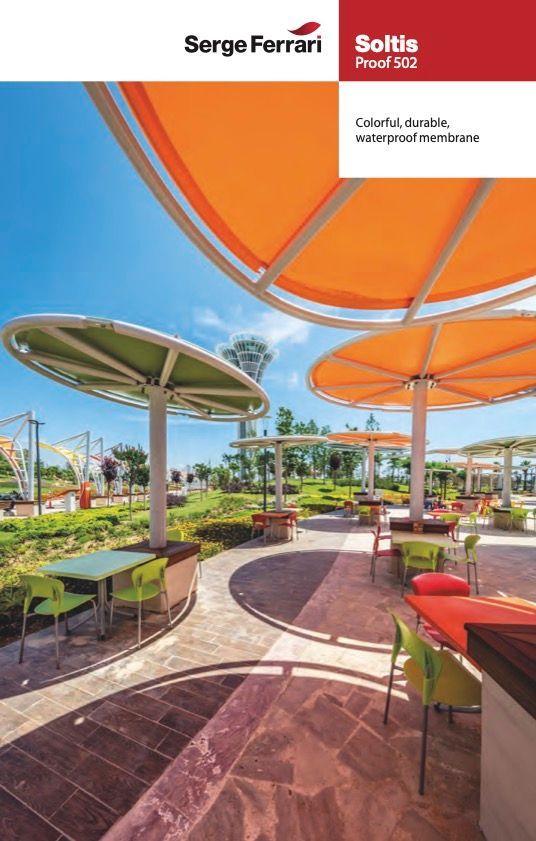 Outdoor Dining Area With Orange Shade — Professional Shade Sail Installation in Garbutt, QLD