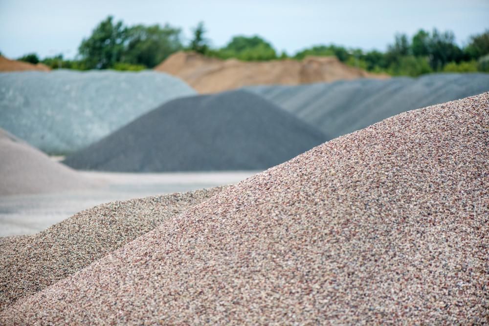 A Pile of Gravel is Stacked on Top of Each Other in a Field — Chooks Sand And Gravel In Bowen, QLD