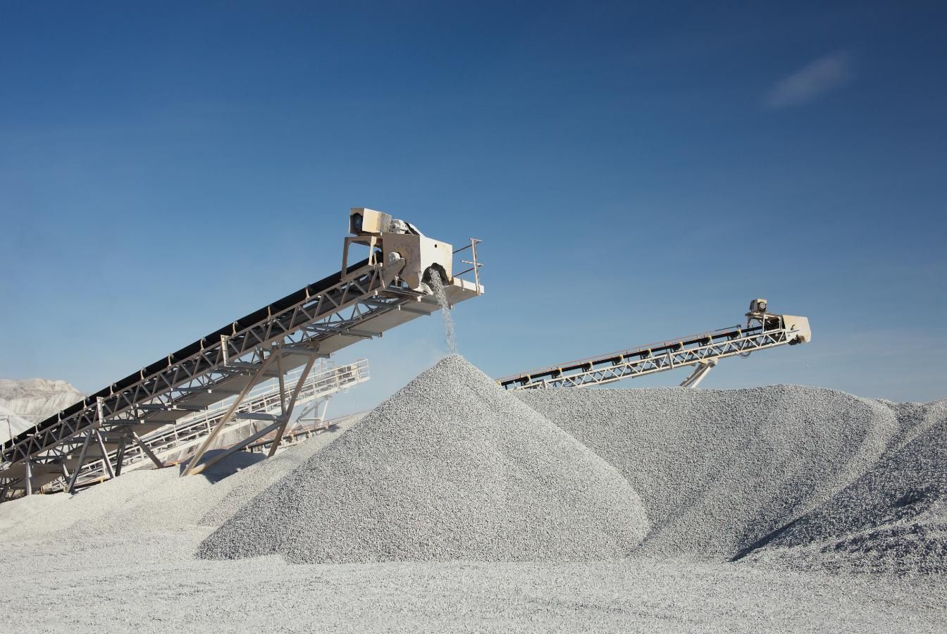 Two Conveyor Belts Are Stacked on Top of a Pile of Gravel — Chooks Sand And Gravel In Paget, QLD