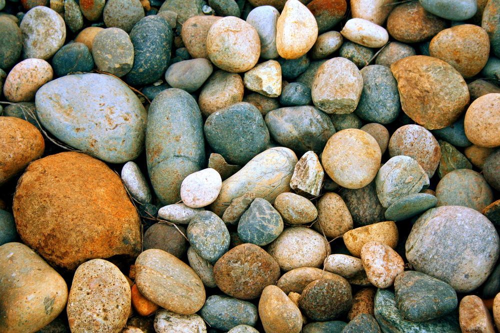A Pile of Rocks of Different Sizes and Colors — Chooks Sand And Gravel In Paget, QLD