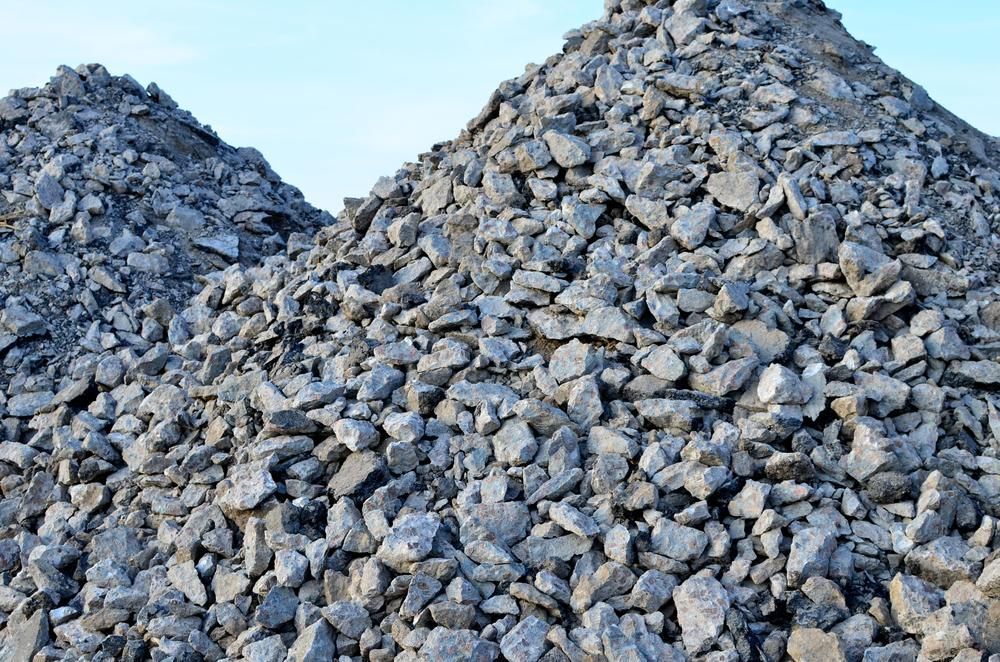 Two Piles of Rocks Are Stacked on Top of Each Other — Chooks Sand And Gravel In Proserpine, QLD