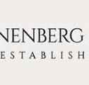 Partial black serif logo text on a light beige background, showing “NENBERG” and “ESTABLISH.”