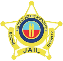 Boone County Jail seal with yellow sheriff star and blue-red center