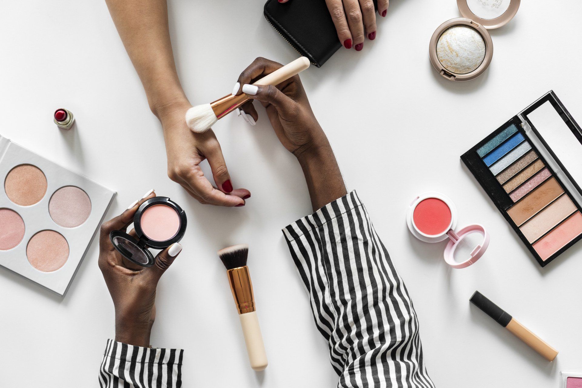 Woman Having a Sample of Beauty Products | Worcester, MA | Menwonw Beauty Supply