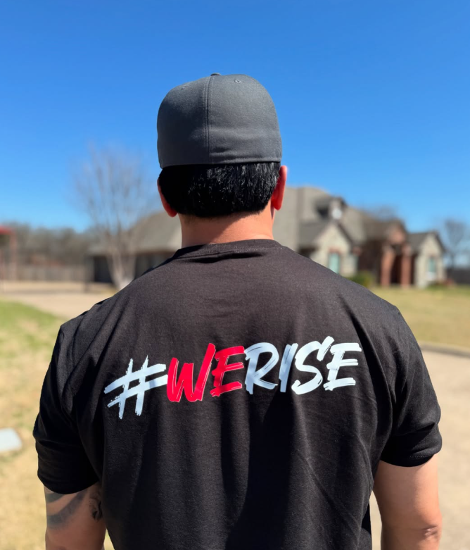 Man wearing a black shirt with 
