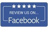 A blue sign that says `` review us on facebook ''. A blue sign that says `` review us on facebook ''.