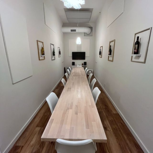 long room with table at winery