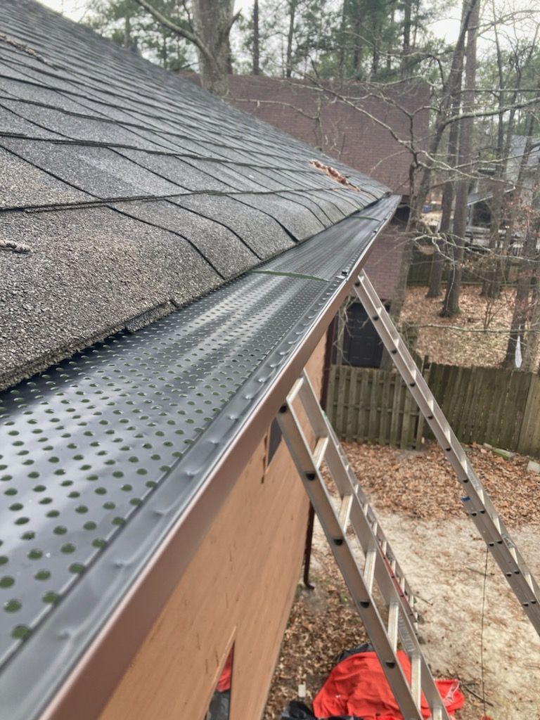 Man preparing the gutter for installation