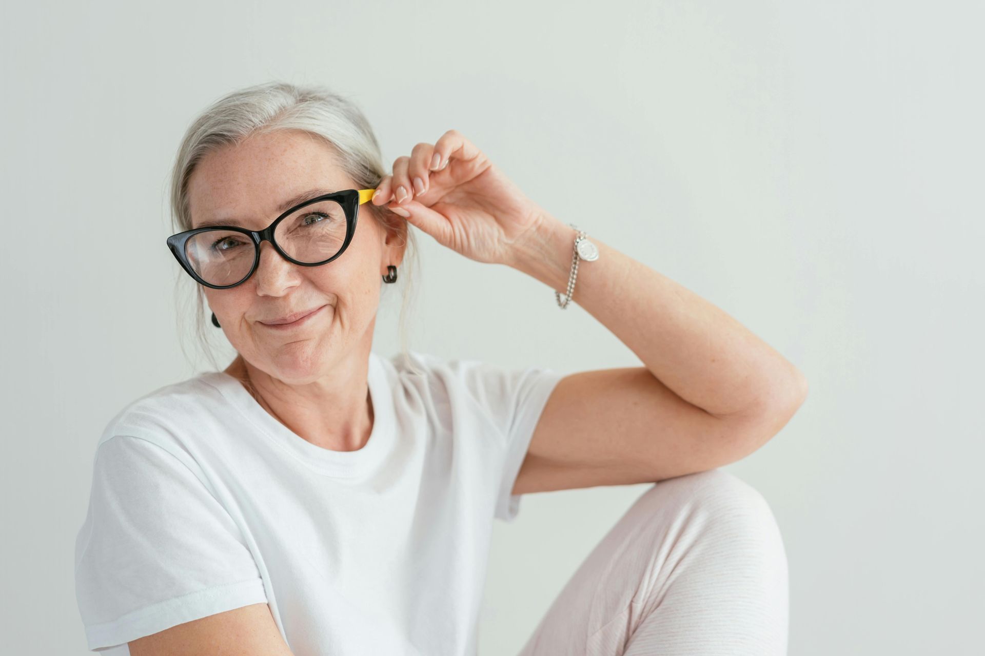 Modern eyewear trends for older ladies featuring stylish glasses.