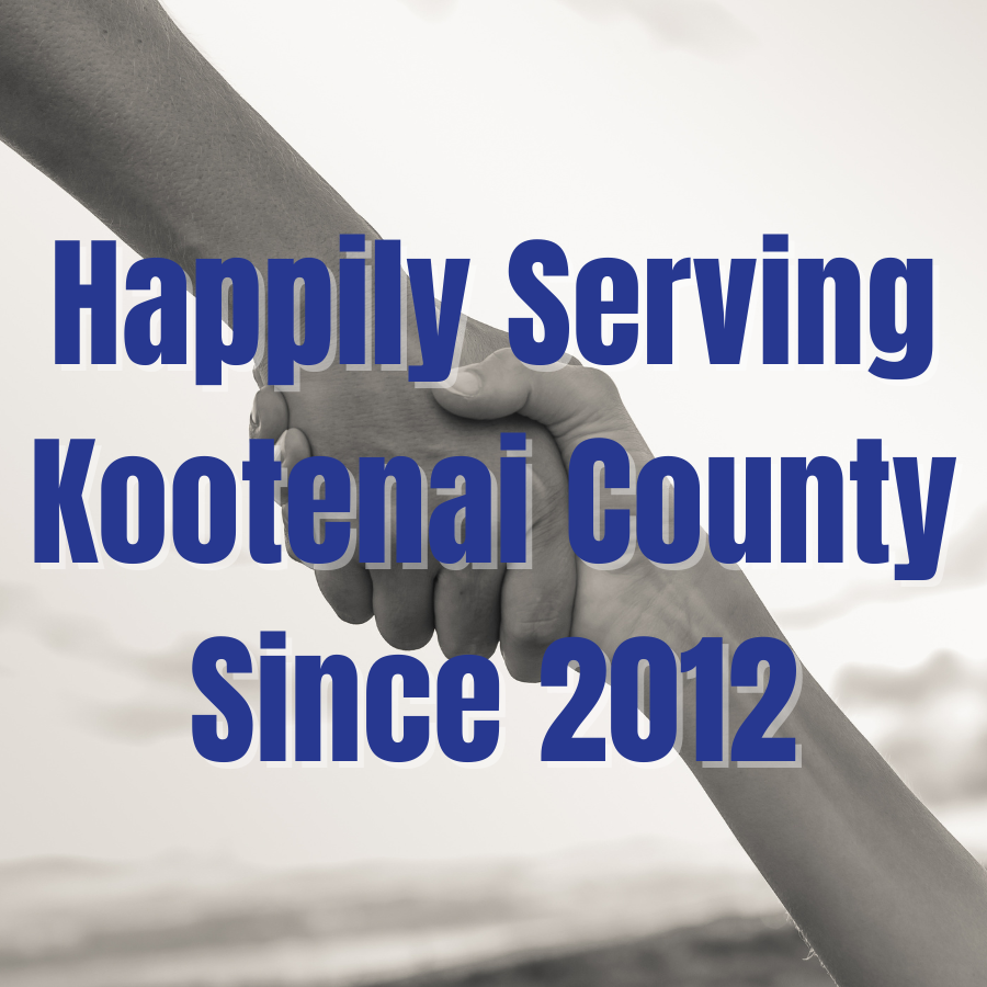Two people shaking hands with the words happily serving kootenai county since 2012