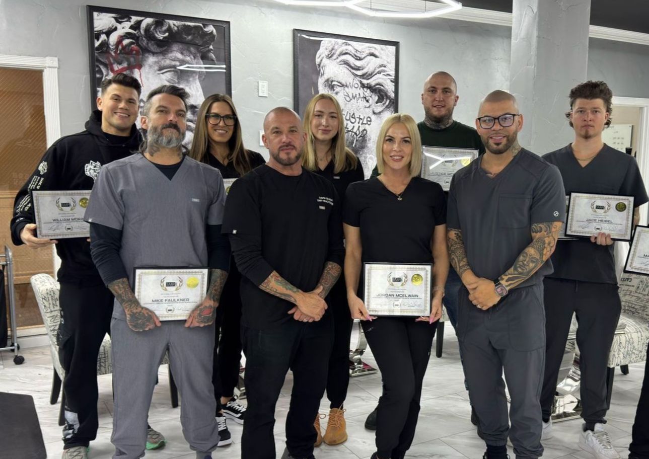 SMP Ink CDA team with their certificates