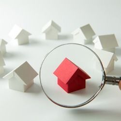 Home inspector conducting full residential home inspection