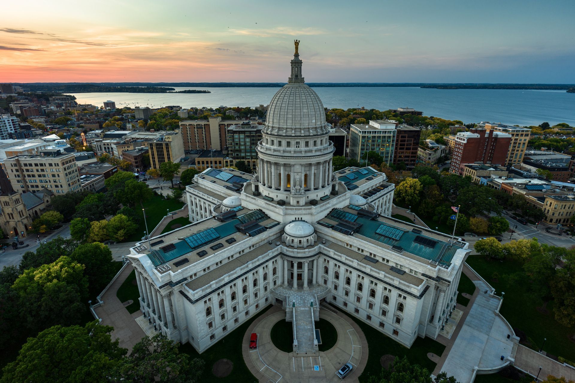 Aerial view of the Wisconsin State Capitol in downtown Madison with Lake Mendota in the background