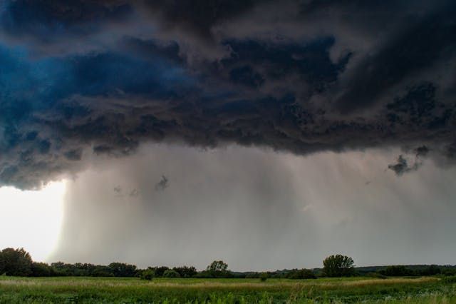 large storm clouds over a field