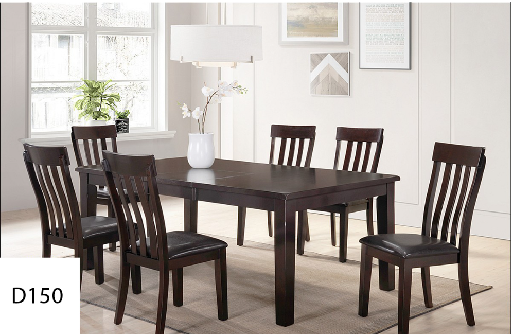 A dining room with a table and chairs in it.