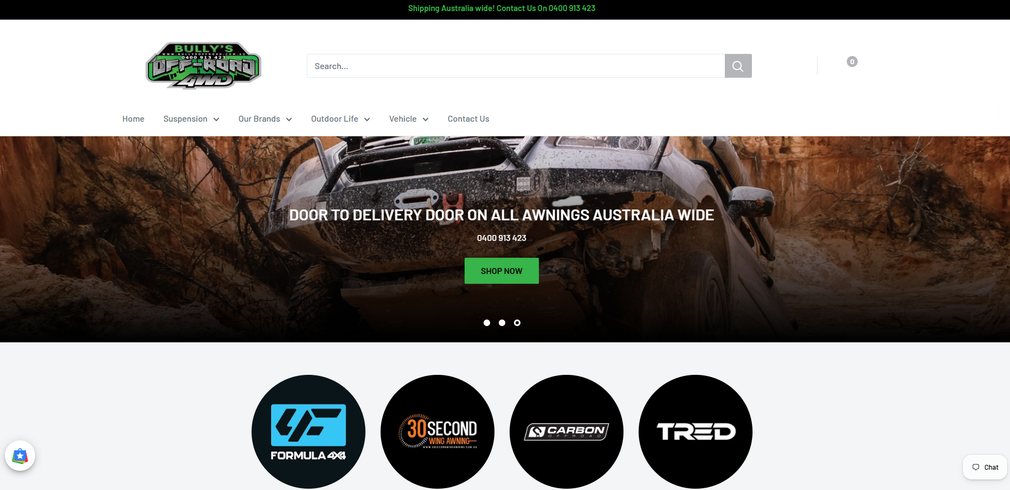 Off-road truck website homepage with muddy truck hero banner and brand logos below