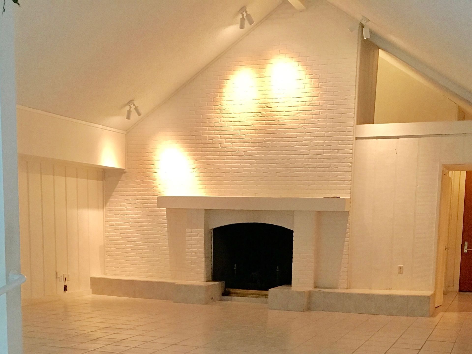 A fireplace waiting renovation by Night 'N' Day Construction while completing a total home remodel in Dallas, TX