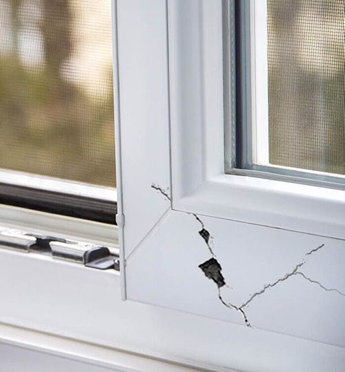 Hail-damaged window in Plano, TX—scheduled for replacement by Night 'N' Day Construction
