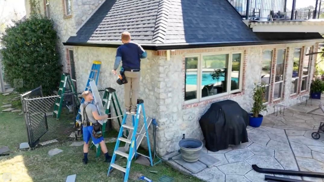 Gutters being installed for an insurance claim