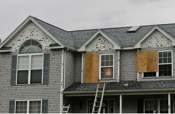 Siding damaged in plano, tx.