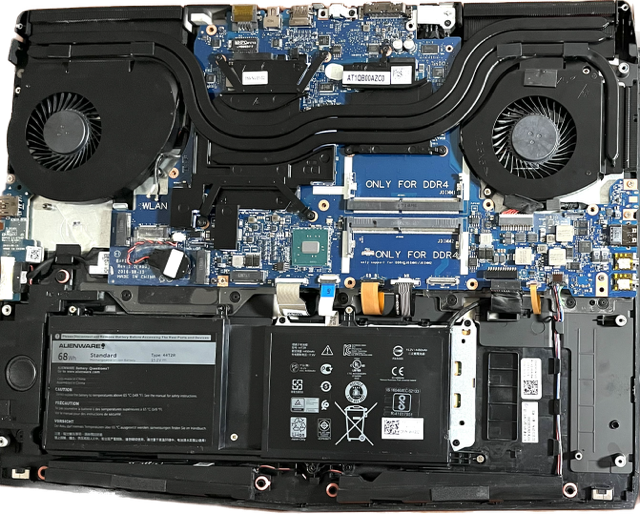 dell alienware laptop with bottom cover remove showing motherboard with fans, heatsink, battery & other components during onsite repair at a White Castle neighborhood.