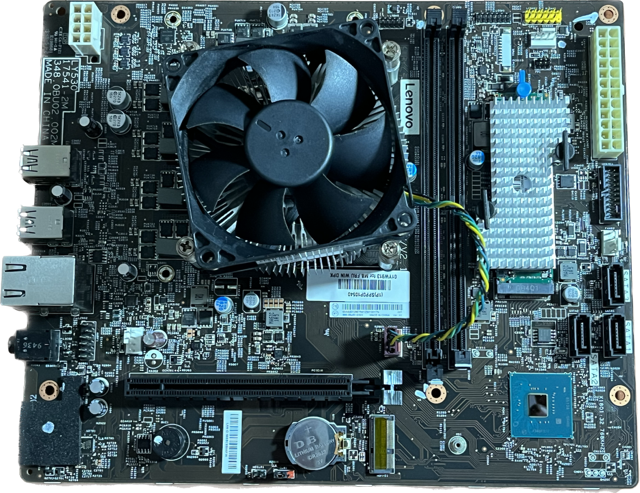 lenovo desktop motherboard with cpu fan installed ready for installation to case during repair