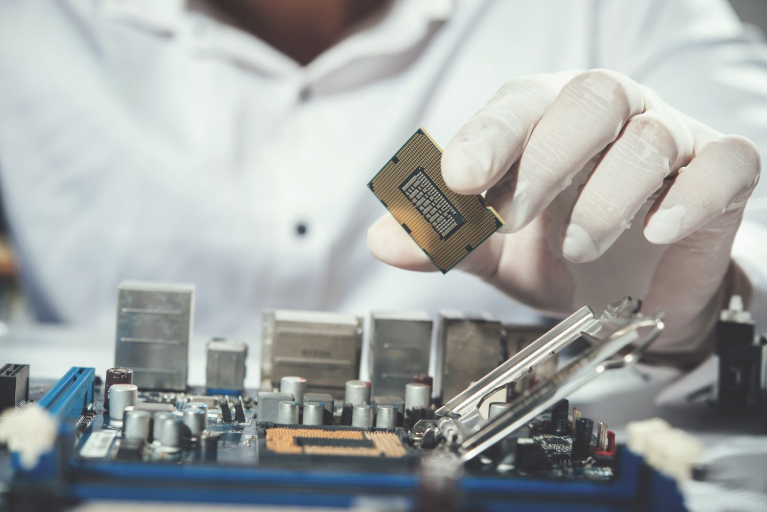 image of technician installing desktop cpu to cpu socket