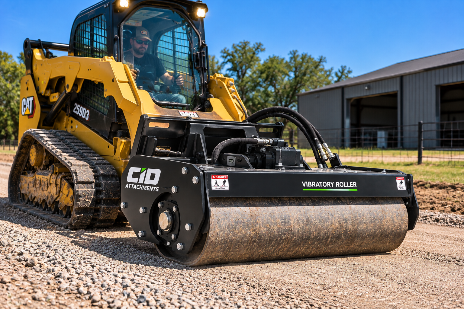 Skid steer with vibrating roller attachment compacting soil