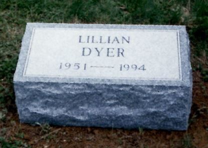 Gray granite gravestone engraved “Lillian Dyer, 1951–1994”