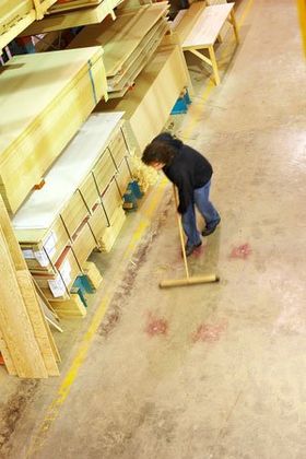 man mopping the floor