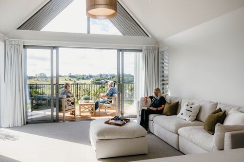 Residents relaxing indoors at Qestral