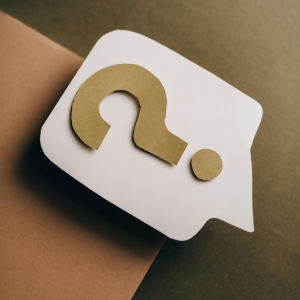 White speech bubble with a gold question mark on a tan and olive background