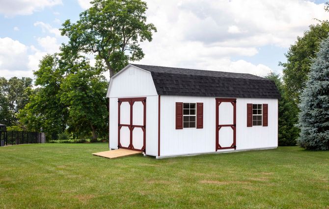 white shed with garage door